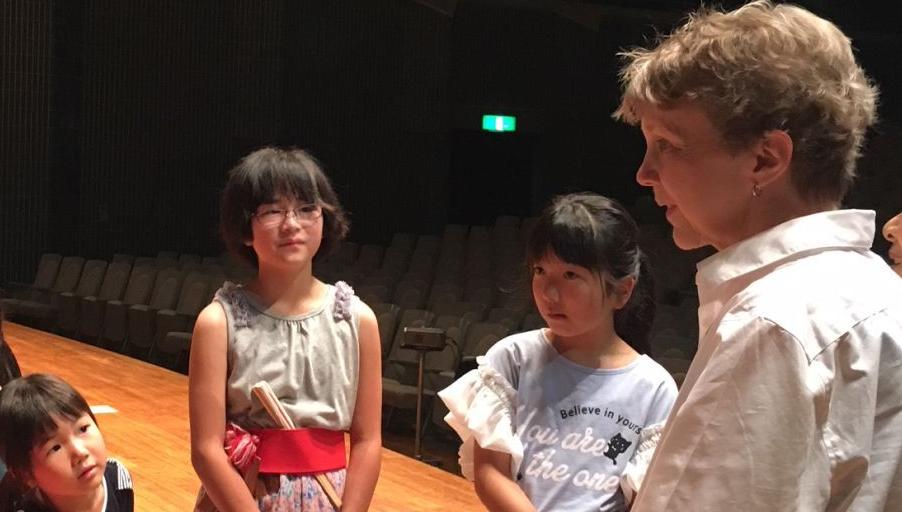 Sarah Bryan Miller with child dancers, Fukushima
